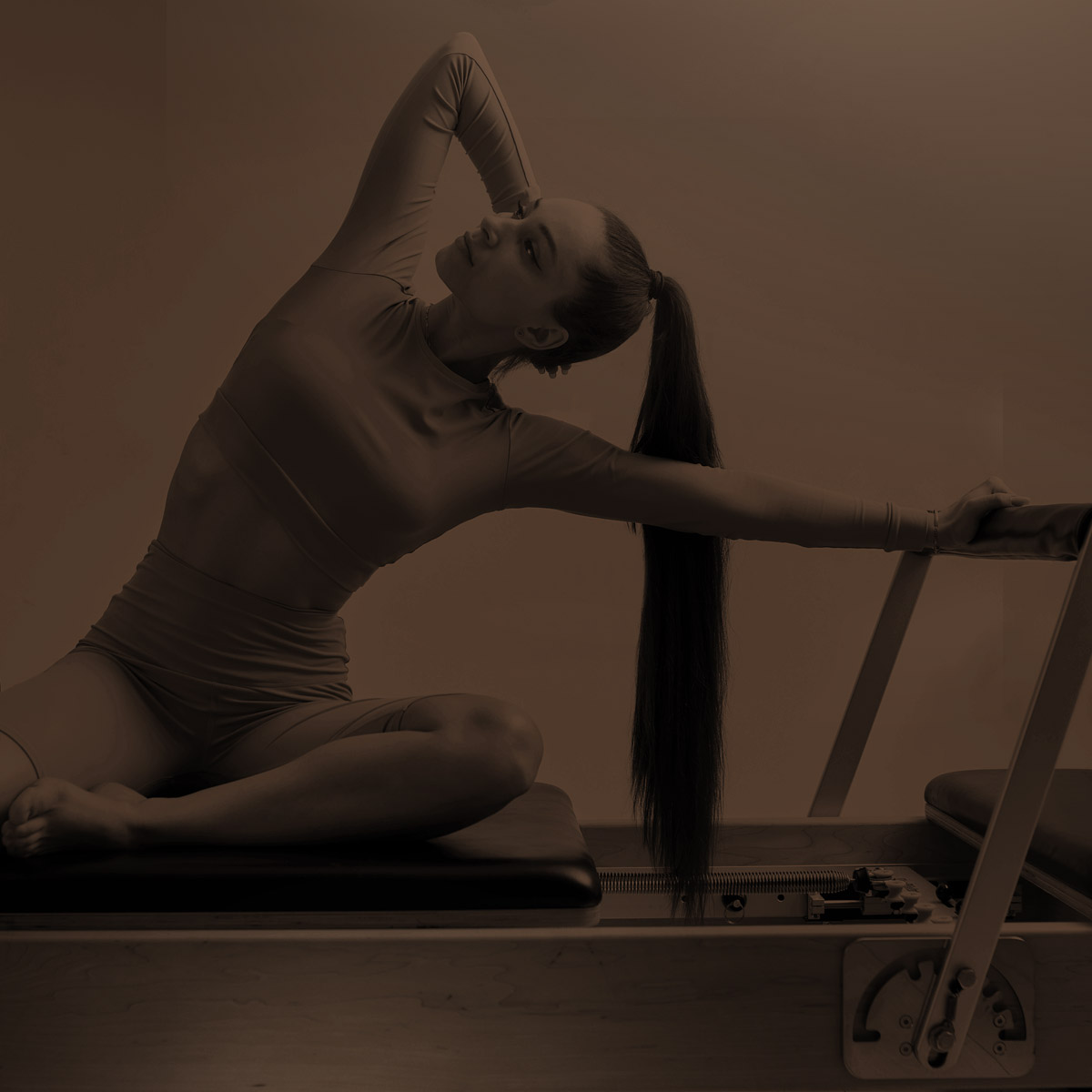 Reformer Pilates am Gerät